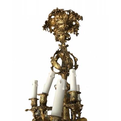 Important lustre en bronze doré d'époque 19 ème de style Louis XV