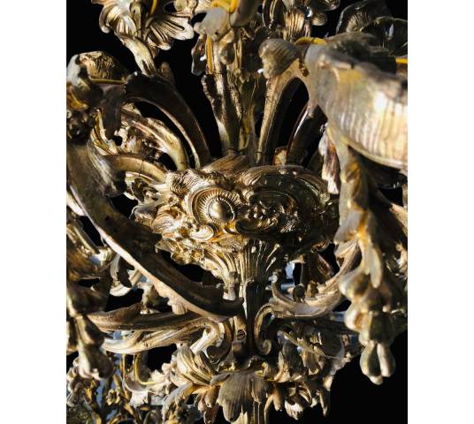 Important chandelier in gilded bronze 19 th of the Louis XV style