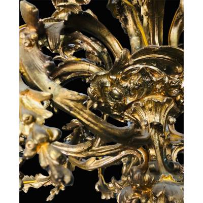 Important chandelier in gilded bronze 19 th of the Louis XV style