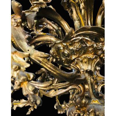 Important chandelier in gilded bronze 19 th of the Louis XV style