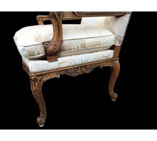 Pair of Louis XIV's armchairs in walnut