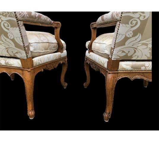 Pair of Louis XIV's armchairs in walnut