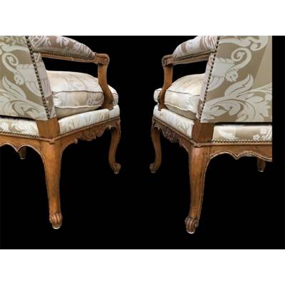 Pair of Louis XIV's armchairs in walnut