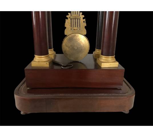 Beautiful portico pendulum column Empire in mahogany period 19 th