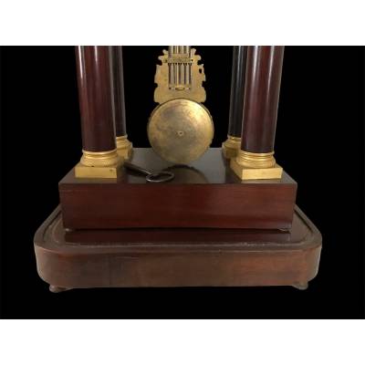 Beautiful portico pendulum column Empire in mahogany period 19 th