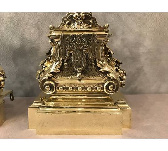 Paire de chenets en bronze poli d'époque 19 ème de style Louis XVI