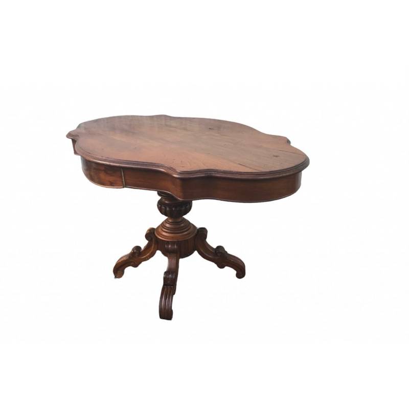 Guéridon table to walnut with a period in the shape of the violin of epoch 19 th