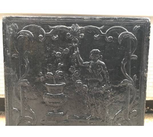 Beautiful fireplace plate in vintage blackened iron 18 th