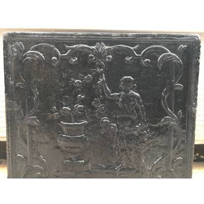 Beautiful fireplace plate in vintage blackened iron 18 th
