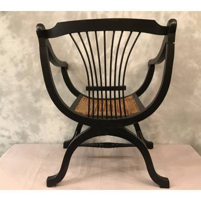 Armchair Dagobert curule in blackened wood around 1900