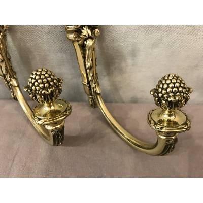 Paire de porte embrases de rideau en bronze de style Louis XVI