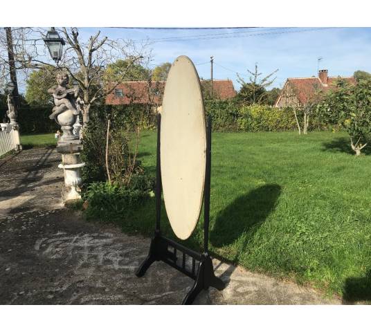 Miroir psyché en bois noirci et bois doré avec un joli miroir ovale d'époque Art Déco