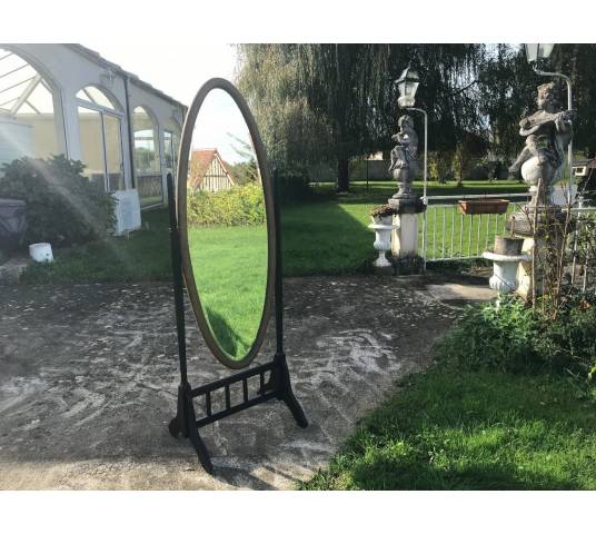 Miroir psyché en bois noirci et bois doré avec un joli miroir ovale d'époque Art Déco